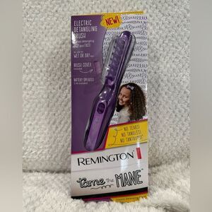 Electric detangling comb by Remington.